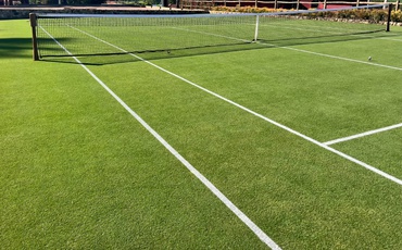 Campo de tênis feito Itograss Tennis Experience